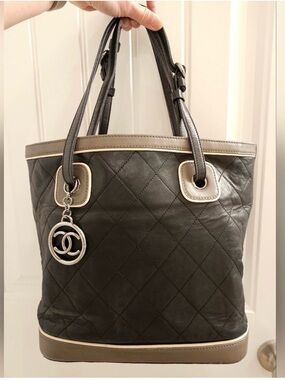 CHANEL Black Quilted Leather Tote with Taupe Trim and Silver CC Charm